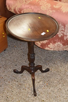 Lot 318 - A mahogany wine table with circular dished top...