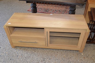 Lot 325 - A modern light oak television cabinet