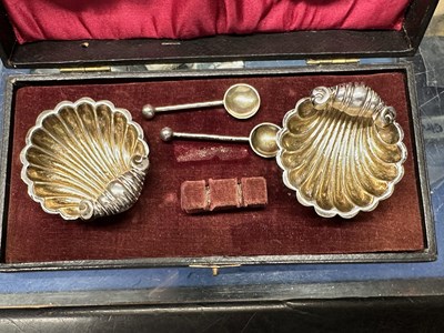 Lot 149 - A pair of white metal shell formed salts