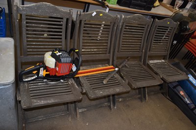 Lot 701 - Four assorted folding wooden chairs