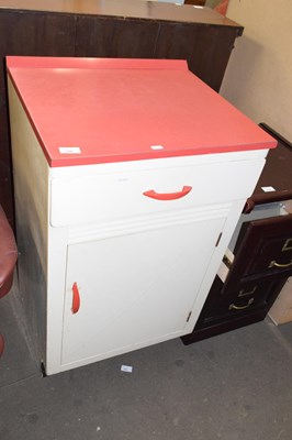 Lot 748 - A mid Century red and white kitchen cupboard...