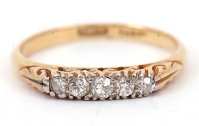 Lot 41 - An 18ct diamond ring, with five small old mine...