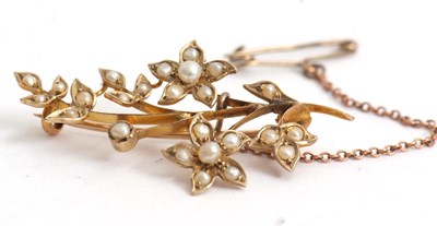 Lot 104 - A seed pearl brooch, the floral sprig set...