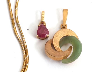 Lot 119 - Two gemset pendants: to include a pear shape...
