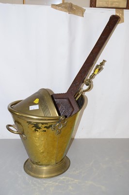 Lot 1 - A brass coal bucket together with brass fire...
