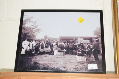 Lot 30 - A framed black and white photograph showing...