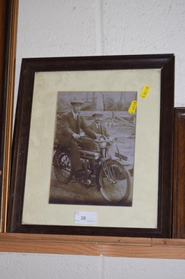 Lot 38 - Black and white photograph of figures with an...