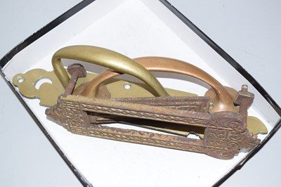 Lot 61 - A vintage iron letter box and brass door handles