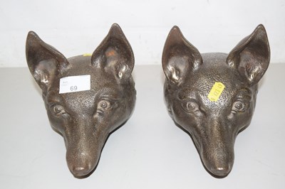 Lot 69 - Pair of cast iron fox head door stops