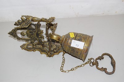 Lot 73 - A brass wall mounted bell
