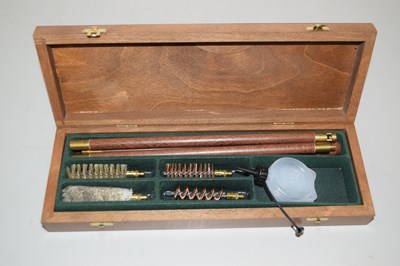 Lot 76 - Cased gun cleaning rods and brushes