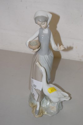 Lot 83 - A Lladro figure of a girl with goose
