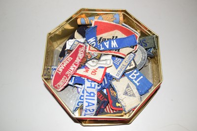 Lot 87 - A box of various military and other sew on...