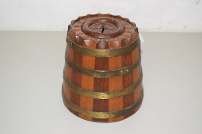 Lot 100 - A vintage wooden money box