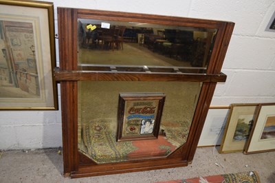Lot 265 - A composite oak framed wall mirror with Coca...