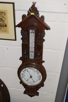 Lot 290 - A late Victorian barometer in carved frame