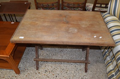 Lot 315 - Small rectangular table with plywood top and X...