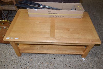 Lot 322 - A 20th Century oak rectangular coffee table,...