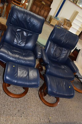 Lot 345 - A pair of Stressless blue leather armchairs...