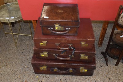 Lot 352 - Group of four vintage leather suitcases, all...