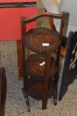Lot 353 - A three tier cake stand