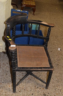 Lot 360 - A late 19th Century ebonised corner chair with...
