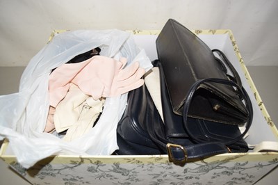 Lot 522 - A box of assorted handbags, ladies gloves etc