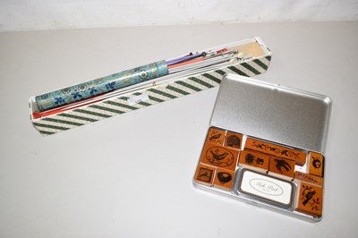 Lot 536 - A box of knitting needles and a box of rubber...