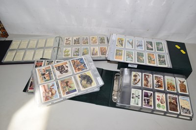 Lot 543 - A range of cigarette cards to include Players,...