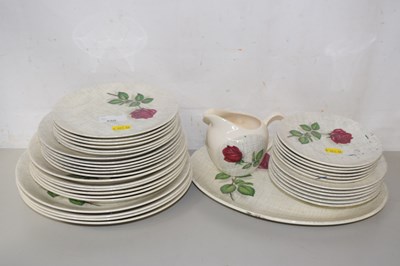 Lot 550 - A quantity of J&G Meakin rose decorated table...