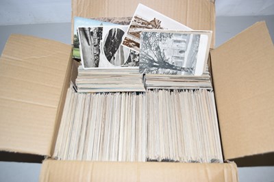Lot 385 - A shoe box of foreign postcards