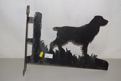 Lot 627 - An iron wall bracket formed as a Spaniel