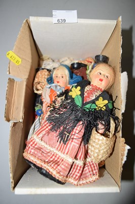 Lot 639 - A box of vintage costume dolls