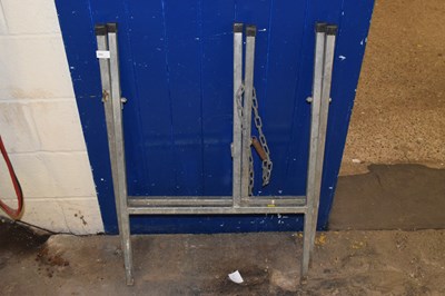 Lot 845 - A folding metal stand