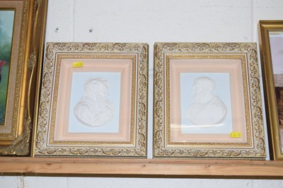 Lot 32A - A pair of reproduction plaster plaques John...