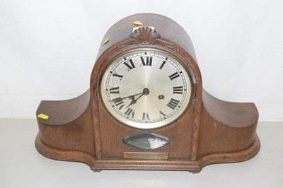 Lot 49 - A large oak cased mantel clock with...