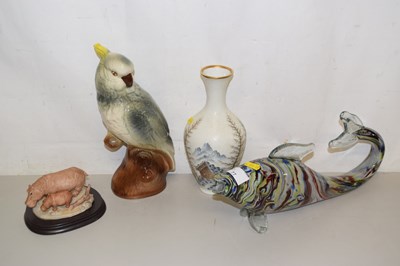 Lot 77 - A porcelain parrot together with glass fish, a...