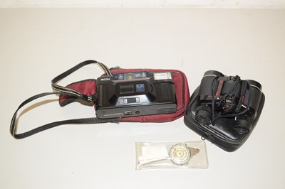 Lot 82 - A pair of travel binoculars, a Ricoh camera...