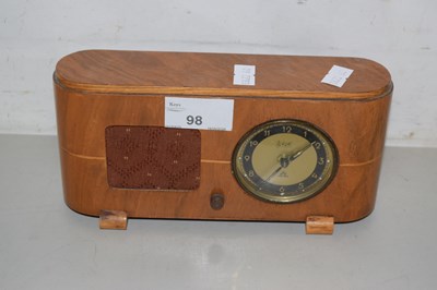 Lot 98 - A Peter Art Deco walnut cased musical bedside...