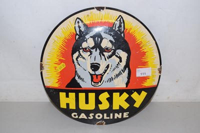Lot 111 - A Husky Gasoline enamel sign