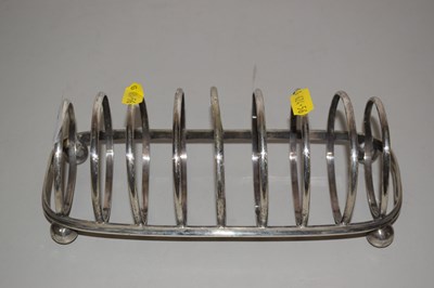 Lot 157 - A silver plated toast rack