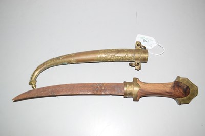 Lot 159 - An Indian brass mounted and hardwood handled...