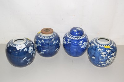 Lot 183 - Four prunus pattern ginger jars, one converted...