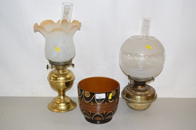 Lot 191 - Two oil lamps and a jardiniere