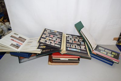 Lot 218 - A world stamp collection housed in stock books...