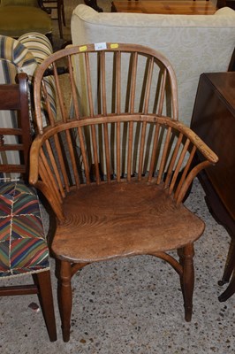 Lot 319 - A 19th Century elm seated Windsor chair