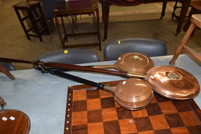 Lot 335 - Three various copper bed warming pans