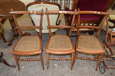 Lot 347 - Set of three late 19th Century cane seated...