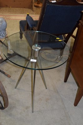 Lot 392 - A glass topped lamp table