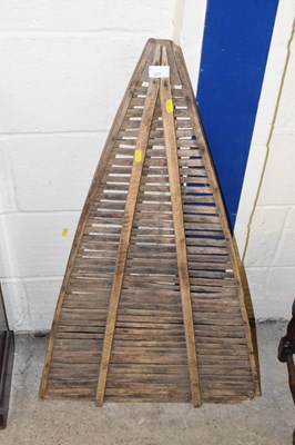 Lot 397 - A vintage French wooden fruit rack